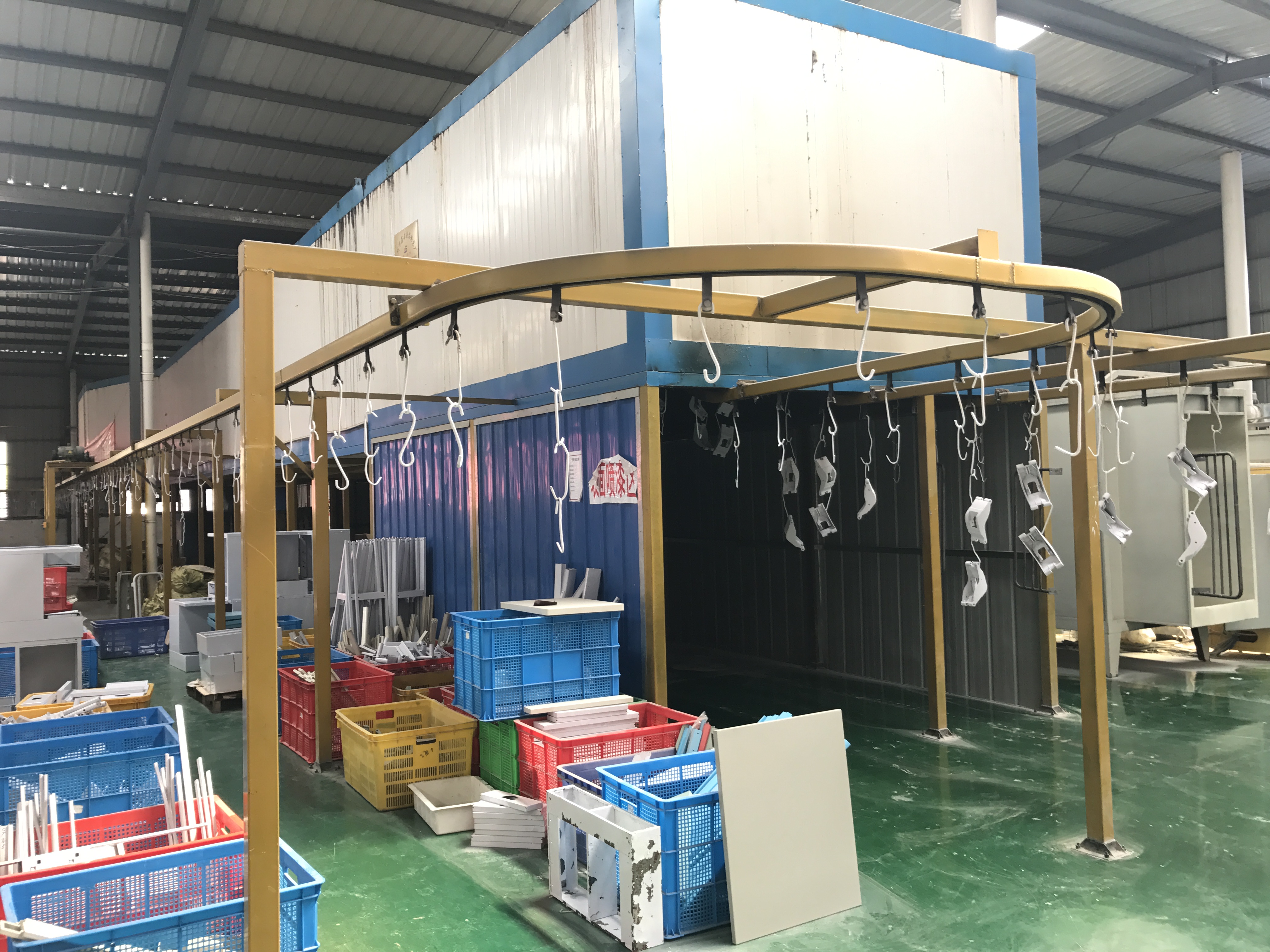 Powder coating line for medical trolley metal components