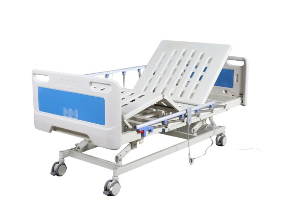Patient care electric hospital bed with height adjustment, CPR, aluminum side rails, and stamping surface